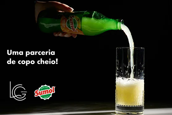 Sumol juice being poured into a customized glass