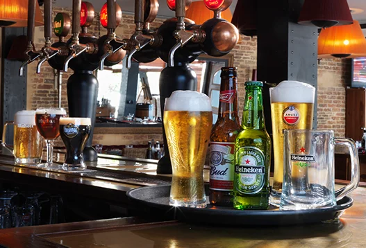 Mugs, glasses and stemware filled with beer