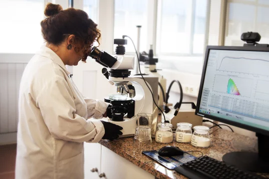 CRISAL employee conducting laboratory analyses on different raw materials